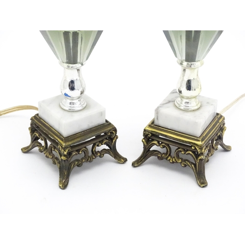 1413 - A matched pair of facet cut glass table lamps with marble detail to base. Approx. 11 1/4