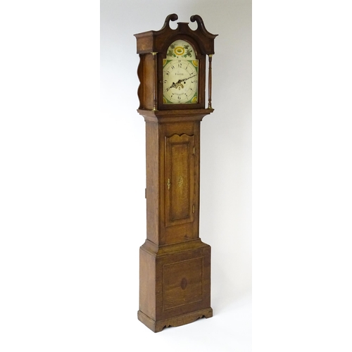 1433 - A 19thC oak cased 8-day longcase clock. The painted arch dial signed Foster  Guildford. The case wit... 