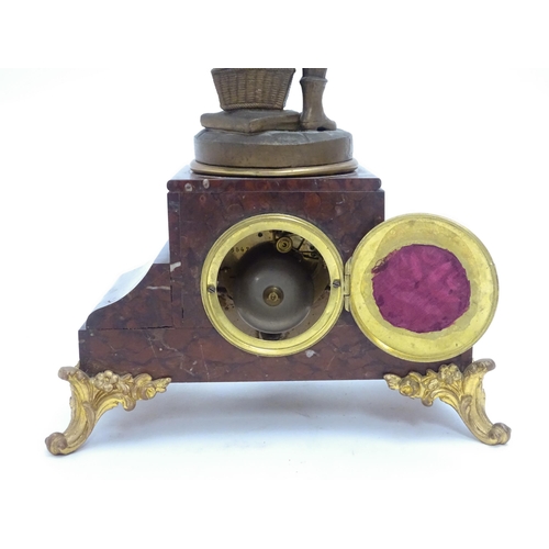 1436 - A French 8-day mantel clock striking on a bell, the rouge marble base housing a movement by A. D. Mo... 