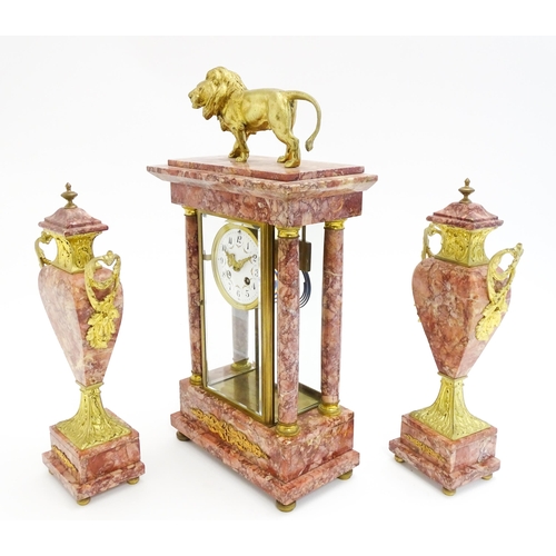 1437 - A 19thC French Three-Piece Clock Garniture, by Marti, having a white dial with floral garland swags,... 