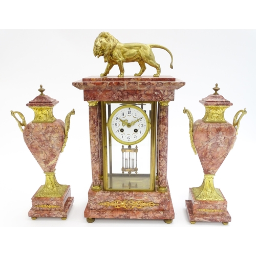 1437 - A 19thC French Three-Piece Clock Garniture, by Marti, having a white dial with floral garland swags,... 