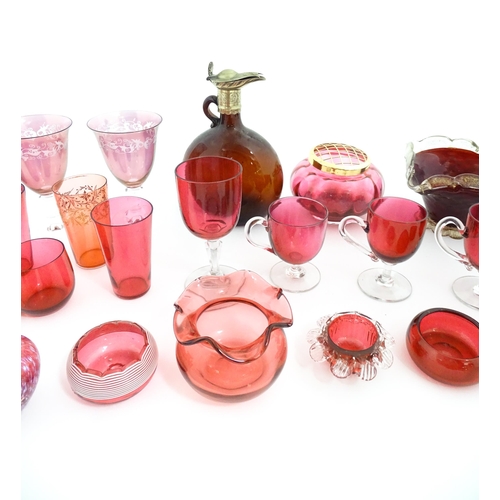 212 - A quantity of Victorian and later assorted glassware to include cranberry glass beakers, drinking gl... 