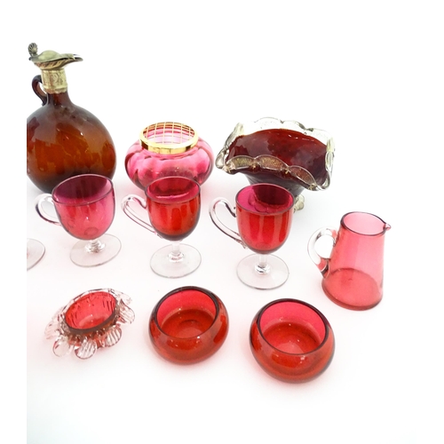 212 - A quantity of Victorian and later assorted glassware to include cranberry glass beakers, drinking gl... 