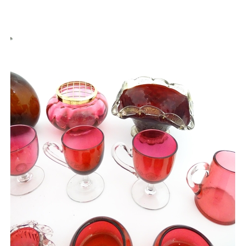 212 - A quantity of Victorian and later assorted glassware to include cranberry glass beakers, drinking gl... 