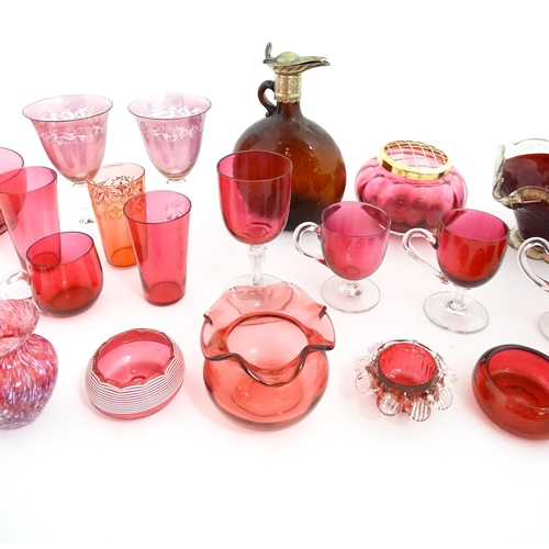 212 - A quantity of Victorian and later assorted glassware to include cranberry glass beakers, drinking gl... 