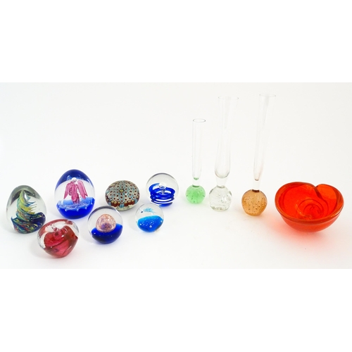 214 - A quantity of assorted art glass paperweights and vases, to include bud vases and a Murano style gla... 