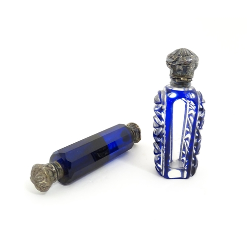 219 - A glass scent / perfume bottle with blue flash cut decoration. Together with a Bristol blue coloured... 