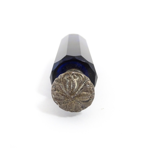 219 - A glass scent / perfume bottle with blue flash cut decoration. Together with a Bristol blue coloured... 