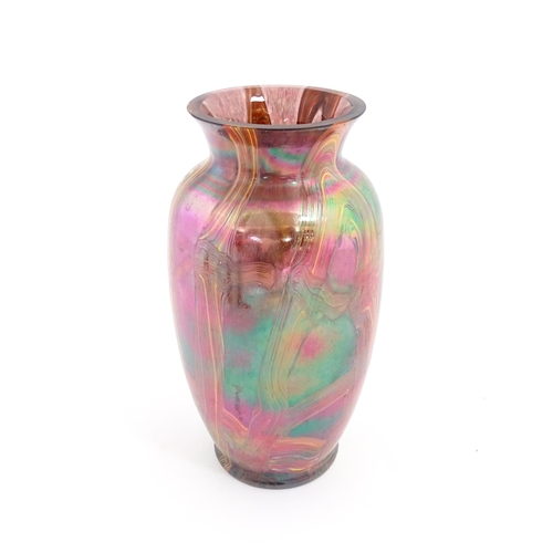 220 - A lustre studio art glass vase in manner of Favrile. Approx. 8 3/4