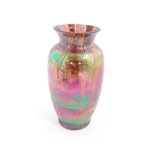 220 - A lustre studio art glass vase in manner of Favrile. Approx. 8 3/4