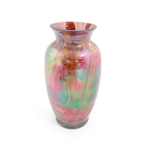 220 - A lustre studio art glass vase in manner of Favrile. Approx. 8 3/4