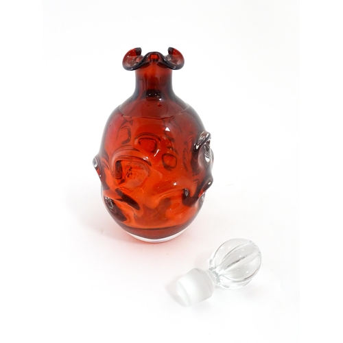 225 - A Swedish studio glass decanter designed by Borne Augustsson for Aseda Glasbruk. Approx. 11