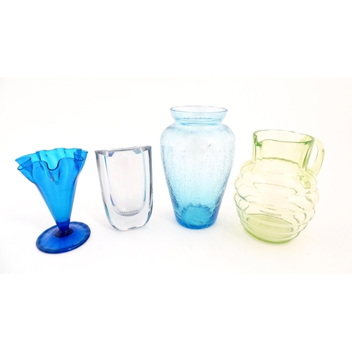 230 - Four items of 20thC glassware to include a Uranium jug, a blue ice glass vase, a Swedish vase by Str... 