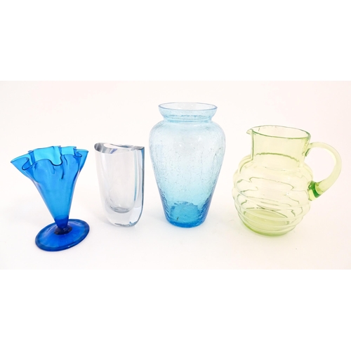 230 - Four items of 20thC glassware to include a Uranium jug, a blue ice glass vase, a Swedish vase by Str... 