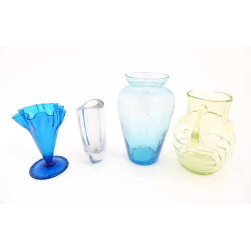 230 - Four items of 20thC glassware to include a Uranium jug, a blue ice glass vase, a Swedish vase by Str... 