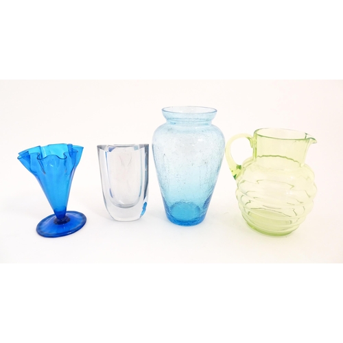 230 - Four items of 20thC glassware to include a Uranium jug, a blue ice glass vase, a Swedish vase by Str... 