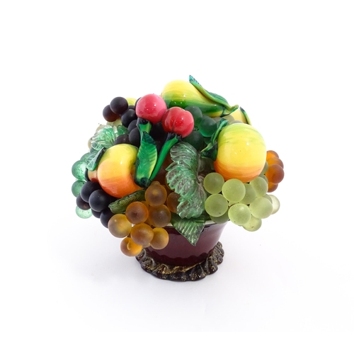 237 - A quantity of assorted glass model fruits. Together with a centrepiece fruit bowl. Centrepiece appro... 