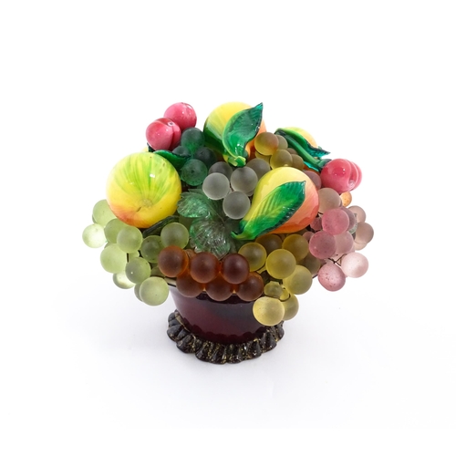 237 - A quantity of assorted glass model fruits. Together with a centrepiece fruit bowl. Centrepiece appro... 