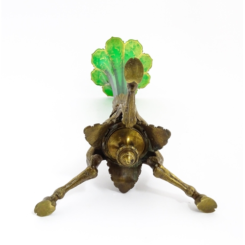 240 - A Victorian epergne, the green glass flute with gilt highlights on a gilt metal triform base. Approx... 