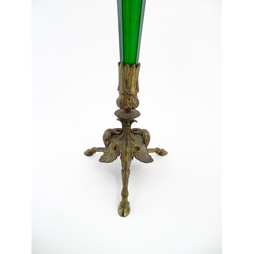 240 - A Victorian epergne, the green glass flute with gilt highlights on a gilt metal triform base. Approx... 