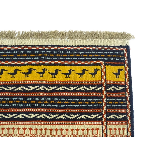 1387 - Carpet / Rug : A North East Persian Sumak kilim rug with banded geometric detail and repeating bird ... 