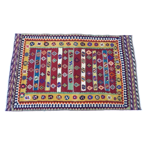 1389 - Carpet / Rug : A South West Persian qashgai kilim rug with banded geometric motifs and borders. Appr... 