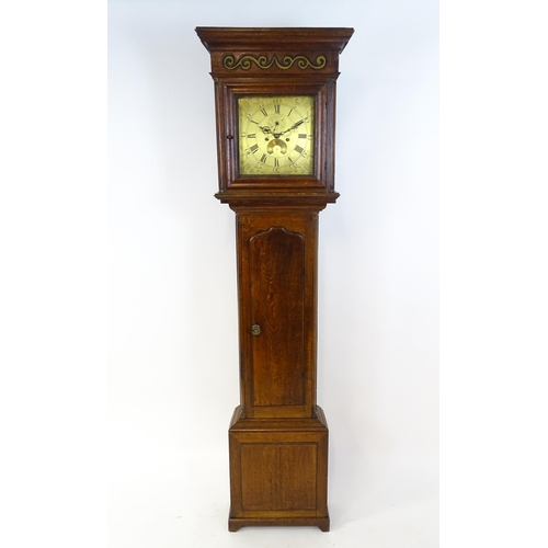 1429 - Dickerson, Framlingham : An oak cased 8-day longcase clock with brass face having Roman numerals and... 