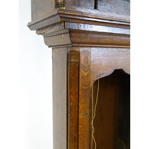 1429 - Dickerson, Framlingham : An oak cased 8-day longcase clock with brass face having Roman numerals and... 