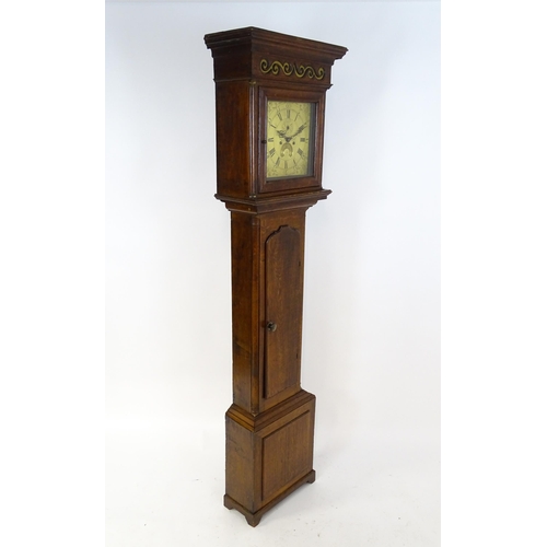 1429 - Dickerson, Framlingham : An oak cased 8-day longcase clock with brass face having Roman numerals and... 