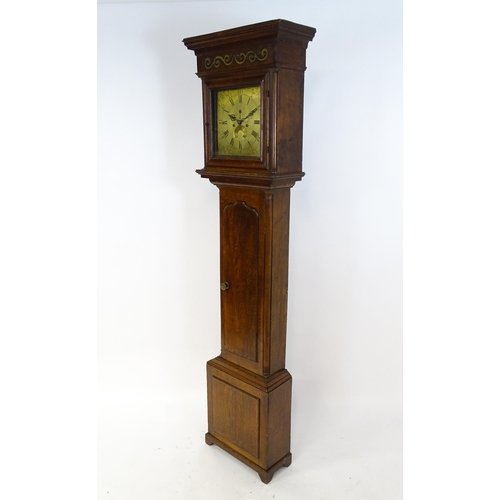 1429 - Dickerson, Framlingham : An oak cased 8-day longcase clock with brass face having Roman numerals and... 