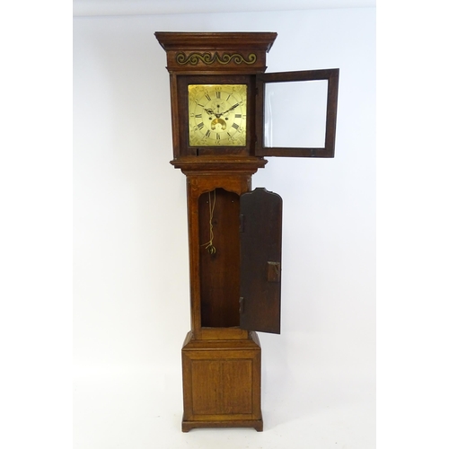 1429 - Dickerson, Framlingham : An oak cased 8-day longcase clock with brass face having Roman numerals and... 