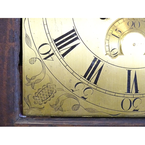 1429 - Dickerson, Framlingham : An oak cased 8-day longcase clock with brass face having Roman numerals and... 