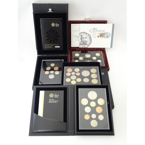 891 - Coins : Four Royal Mint United Kingdom proof sets, comprising a silver proof 1996 set numbered 10604... 