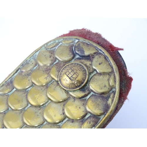 923 - Militaria : a cased French Army Mle 1886 shako cap badge, with Tricolore cockade above stacked arms ... 