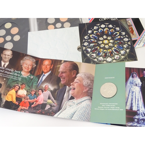 895 - Coins : a quantity of Queen Elizabeth II United Kingdom collectors coins to include two Royal Mint 1... 