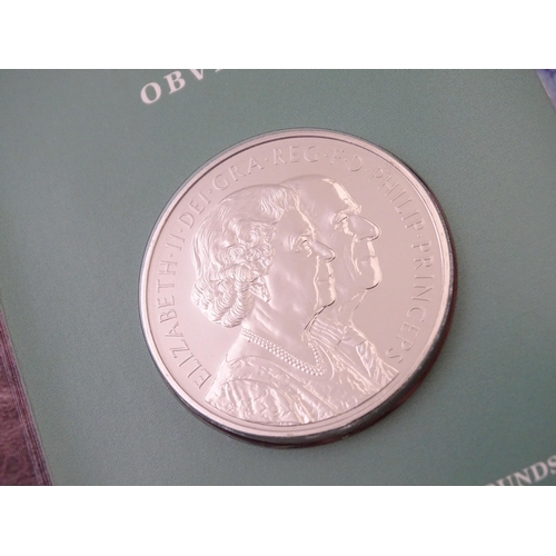 895 - Coins : a quantity of Queen Elizabeth II United Kingdom collectors coins to include two Royal Mint 1... 