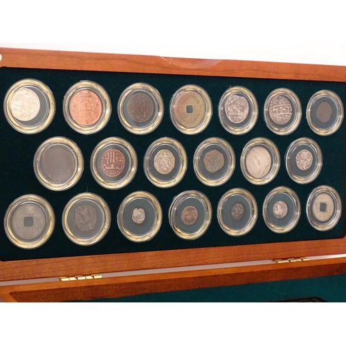 897 - Coins: A cased collection of coins titled The Twenty Centuries AD - Coin Collection, produced by the... 