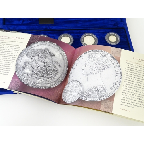 899 - Coins: A Royal Mint 2000 United Kingdom silver proof Millennium coin collection, to include Maundy m... 