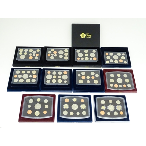 900 - Coins: A quantity of Queen Elizabeth II United Kingdom Royal Mint proof coin collections for the yea... 