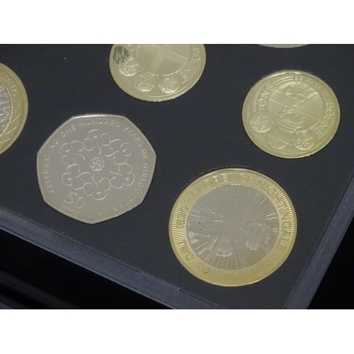 900 - Coins: A quantity of Queen Elizabeth II United Kingdom Royal Mint proof coin collections for the yea... 