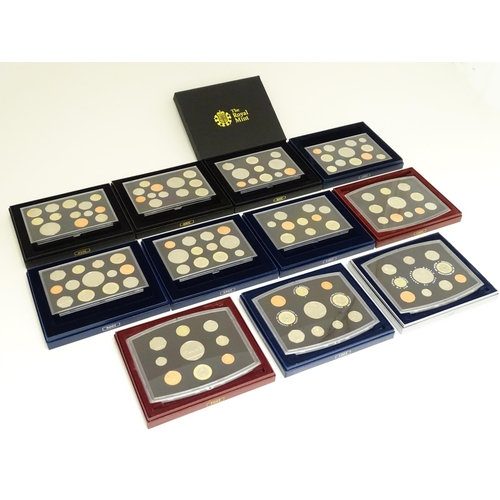 900 - Coins: A quantity of Queen Elizabeth II United Kingdom Royal Mint proof coin collections for the yea... 