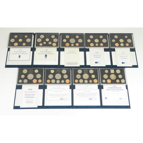 901 - Coins: A quantity of Queen Elizabeth II United Kingdom Royal Mint proof coin collections for the yea... 