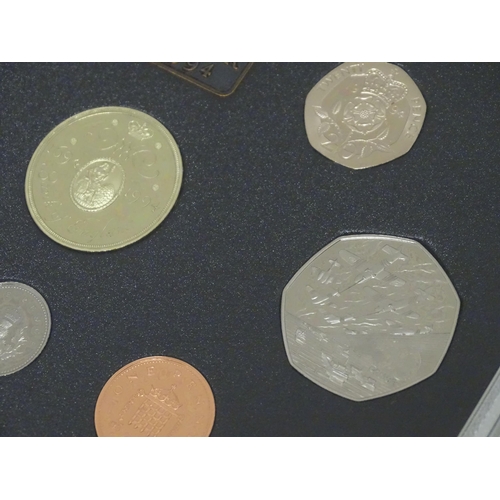 901 - Coins: A quantity of Queen Elizabeth II United Kingdom Royal Mint proof coin collections for the yea... 