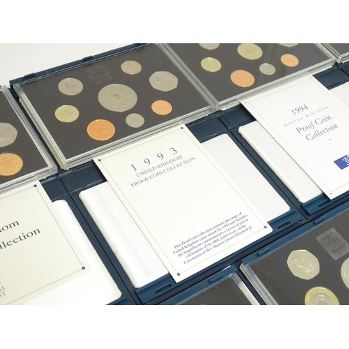 901 - Coins: A quantity of Queen Elizabeth II United Kingdom Royal Mint proof coin collections for the yea... 