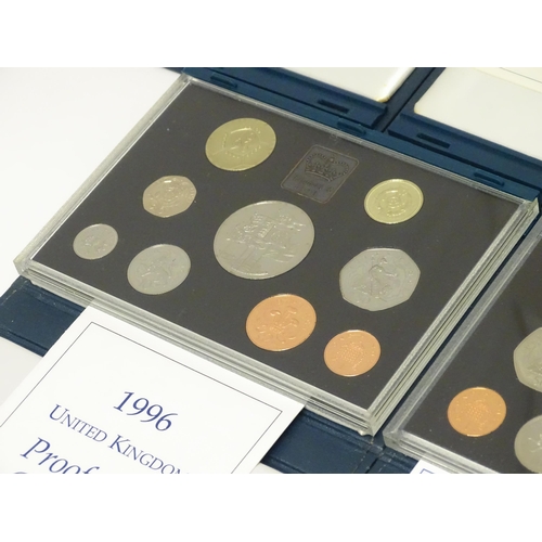 901 - Coins: A quantity of Queen Elizabeth II United Kingdom Royal Mint proof coin collections for the yea... 