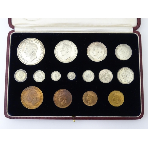 904 - Coins: A Royal Mint 1937 United Kingdom George VI specimen coin set, to include Maundy money coins. ... 