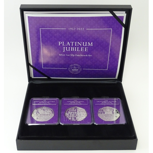 905 - Coins : a cased Royal Mint Queen Elizabeth II Platinum Jubilee (1952-2002) silver 1oz 50p Datestruck... 