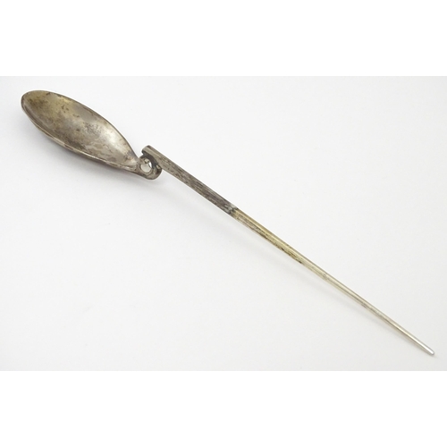 254 - A silver replica of a Roman Christening spoon, indistinctly marked. Approx. 8 1/4