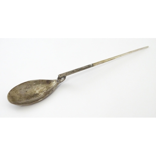 254 - A silver replica of a Roman Christening spoon, indistinctly marked. Approx. 8 1/4