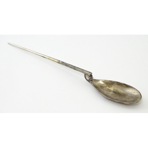 254 - A silver replica of a Roman Christening spoon, indistinctly marked. Approx. 8 1/4